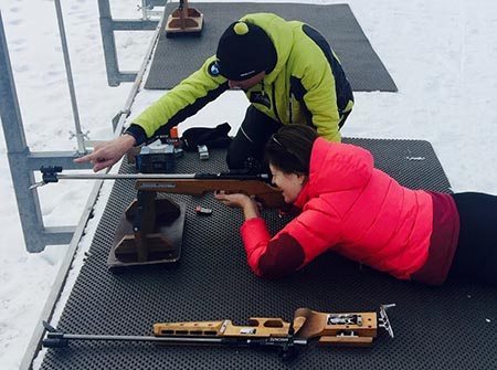 The author takes aim at the biathlon course in Seefeld. Cathie Arquilla photos.