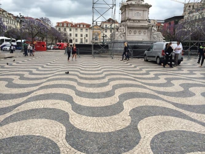 Lisbon is famous for it's decorative small-tile sidewalks, wavy and other designs can be seen. 