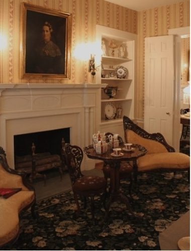 The ladies' parlor complete with a portrait of the first lady.