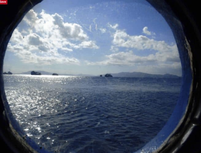 Looking out the cabin window on the Hans Christian Anderson liveaboard ship in the Philippines.