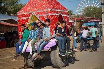 boys on a cart