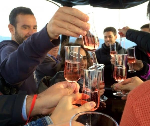 Spaniards don't wait until landing hot air balloons to break out champagne toasts