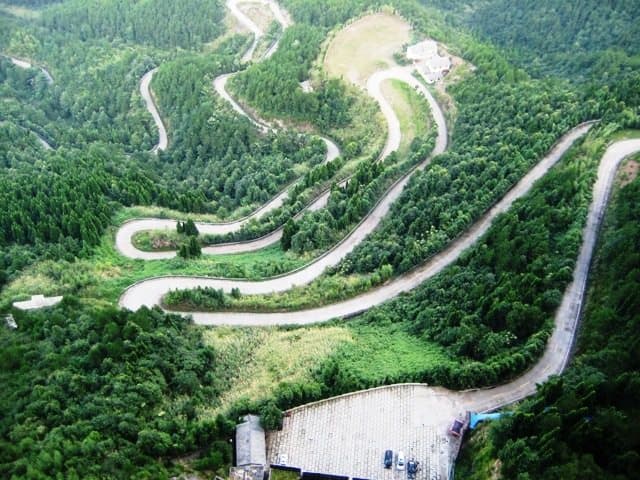 The view from the top to the winding road to the base of the peak in Zhejiang Province China.