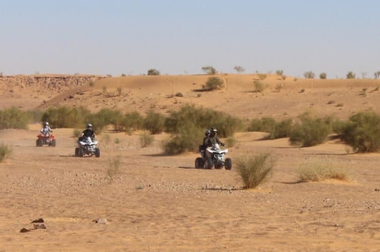 Driving 4x4 ATVs across the desert is a popular pastime here.