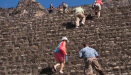 Climbing up an ancient Mayan temple in Belize. Max Hartshorne photo.