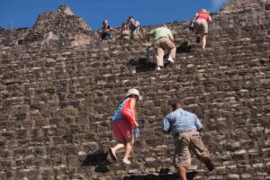 Climbing up an ancient Mayan temple in Belize. Max Hartshorne photo.