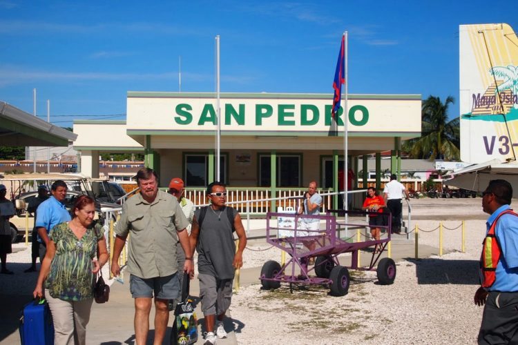 San Pedro's airport is right in the center of the town, a quick golf cart ride from the wharfs where boats take travelers to local resorts.