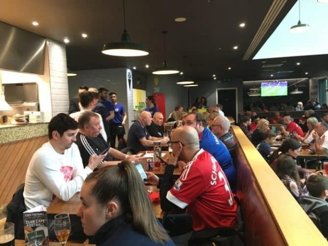 Across from Old Trafford Football stadium, fans enjoy beer and pub food at Cafe Football, part of the Hotel Football complex all built for fans.