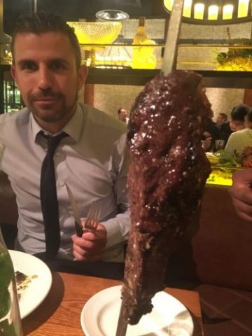 About to devour a giant steak at Fazenda, a Brazilian steak house in Spinningfields, Manchester.