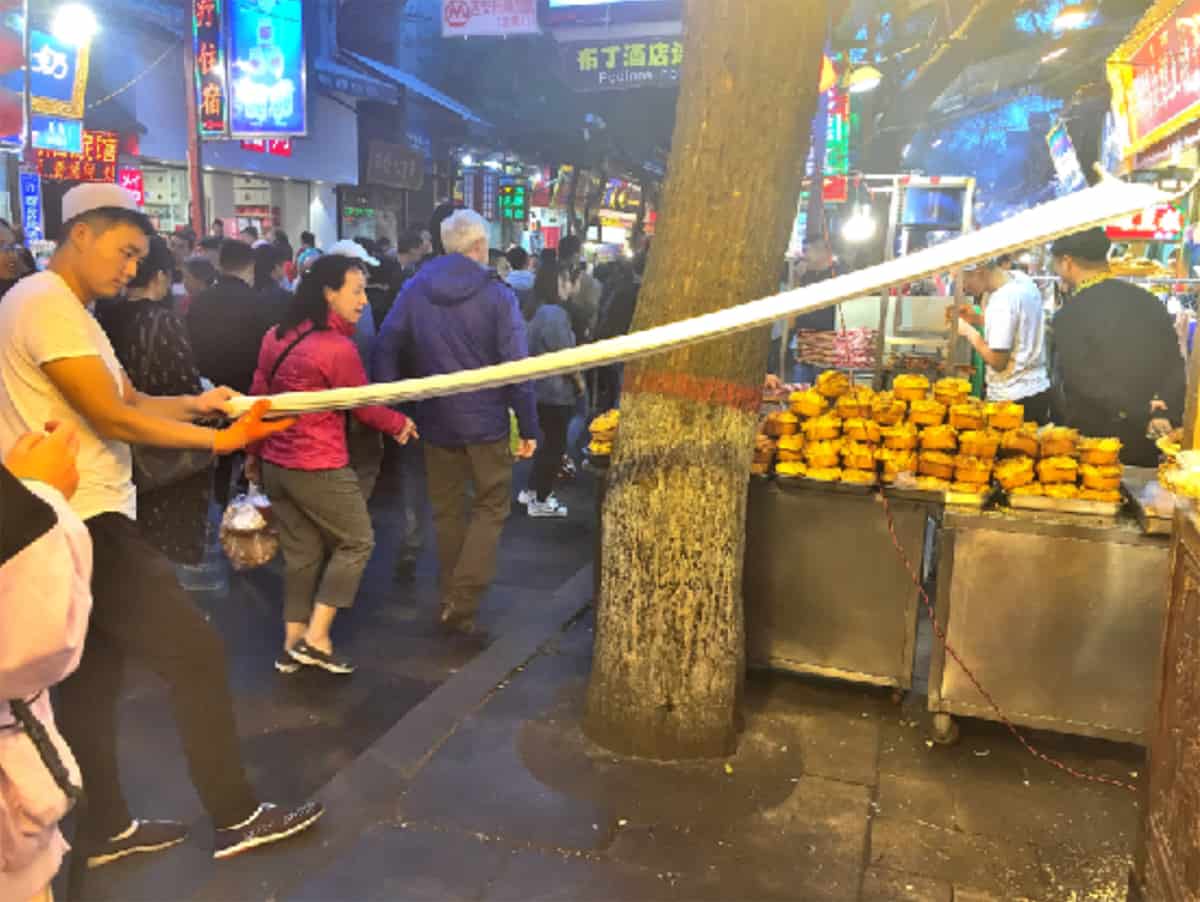 Noodle pulling at North Gate Night Market, Xi'an.
