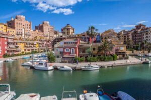 Picturesque beach property in Valencia, Spain where people can park their boats freely and take a stroll.