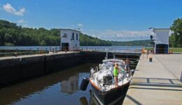 A sailboat navigates Lock Number 10 on the Erie Canal in Amsterdam, NY. FrankForte photo.