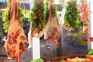 Raw lamb waits to be marinated and grilled for sale on Iskan Street.