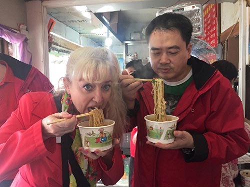 Slurping delicious noodles in a small storefront in Jinzhou.
