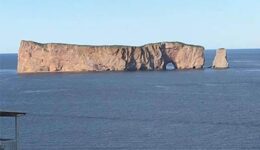 Perce Rock stands just off the coast of Perce, and adjacent to Bonaventure Island, where thousands of gannets nest every year.