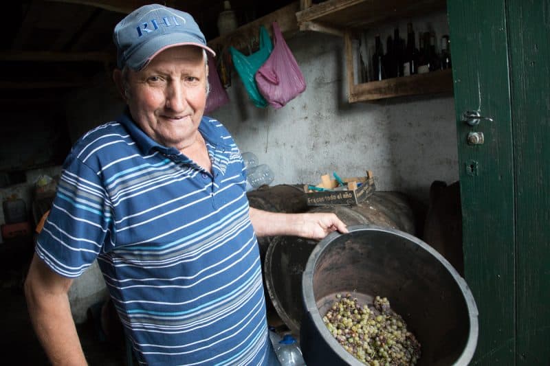 Augusto Silva shows us where he makes his homemade herbal liqueurs at his farm on Pico. Paul Shoul photo.