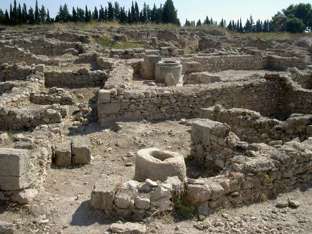 Ugarit remains of building structure with stone vessels Salloum