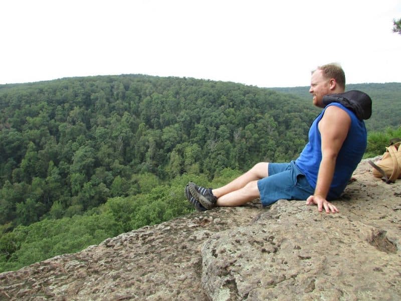 At the summit. Female hikers need to take reasonable precautions while hiking, woman hiking alone..