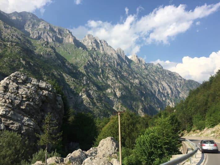 Sharp peaks line the road leading into Valbonë Valley in the Albanian Alps.