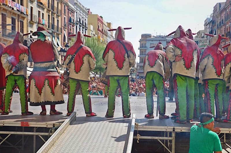 Tarragona, Spain: The Place Where Catalonian Culture Comes Alive 3 Locals dressed as mythological characters set giant sparklers ablaze in front of the public.