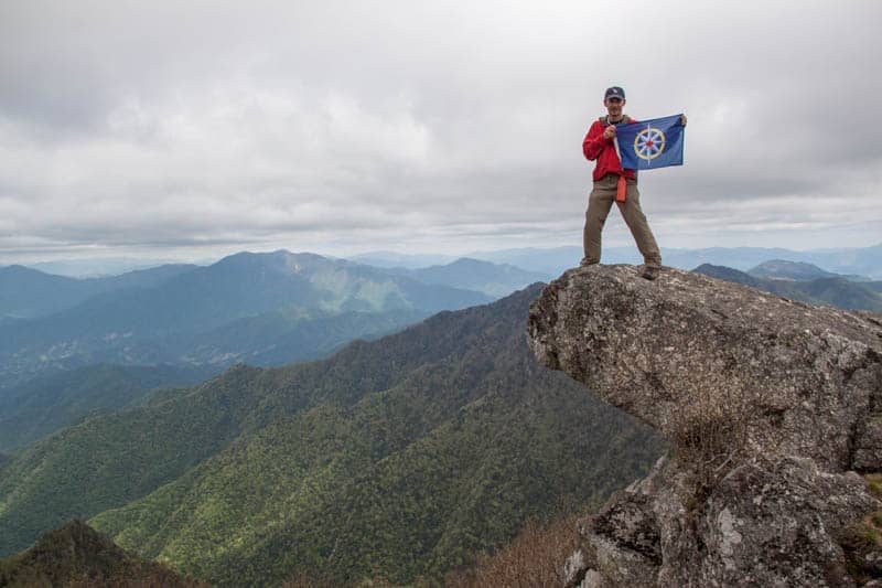 Secret Compass teammate George Kourounis at the summit of Piro Peak.