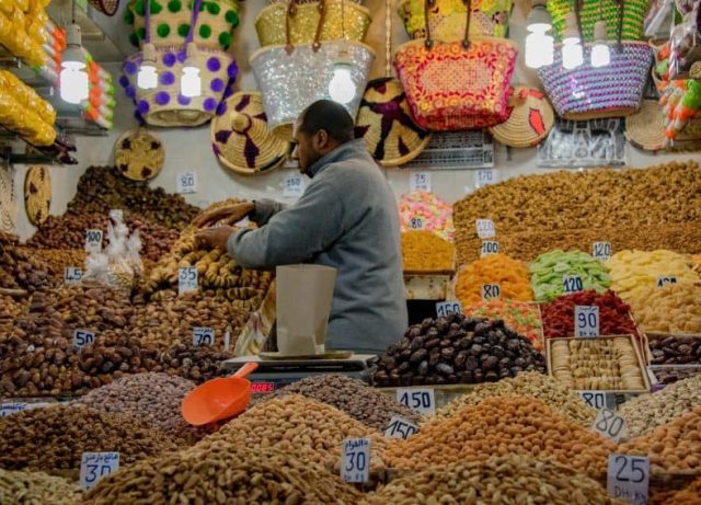 Fez is a city with 10,000 streets packed with all varieties of tiny shops. Vendors make the most of their space by displaying their goods in a stacked fashion while leaving room for themselves to efficiently wait on customers.