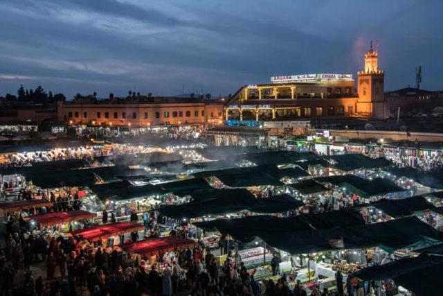 The main square of Marrakech, known as Jemaa el-Fnaa, becomes a sea of food stalls when the sun goes down.  It's a bit of a chaotic scene, but if you're keen on mingling with locals, this is the place to make it happen while watching the cooks prepare your meal.   A safe bet for this street food is grilled meats, cooked vegetables, and steamed clams.