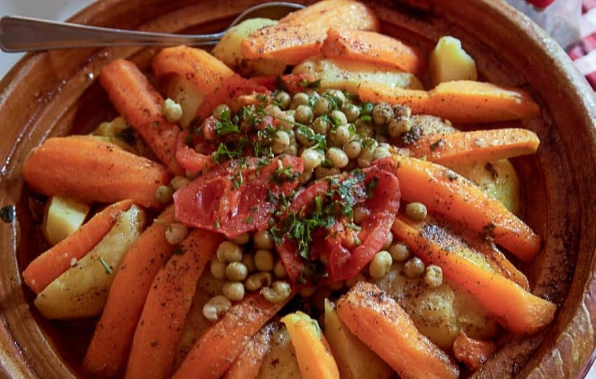 A common dish in Morocco is tagine, a slow-cooked stew made with either meat, chicken, and vegetables.  Tagine also refers to the cone shaped pottery vessel used in the process of cooking a tagine. Symmetry is key to the presentation of Moroccan dishes.