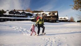 Snowshoe front of lodge