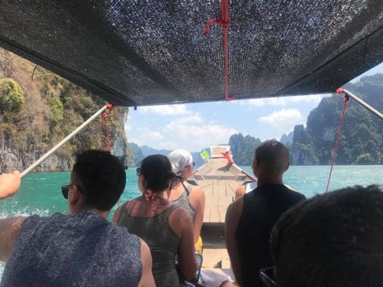 Riding in the long boat to the floating bungalows in Thailand. Hayley Anderson photos. | GoNOMAD Travel Riding in the long boat to the floating bungalows in Thailand. Hayley Anderson photos. | GoNOMAD Travel