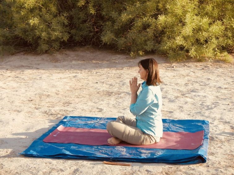 Desert yoga with the sunrise. | GoNOMAD Travel