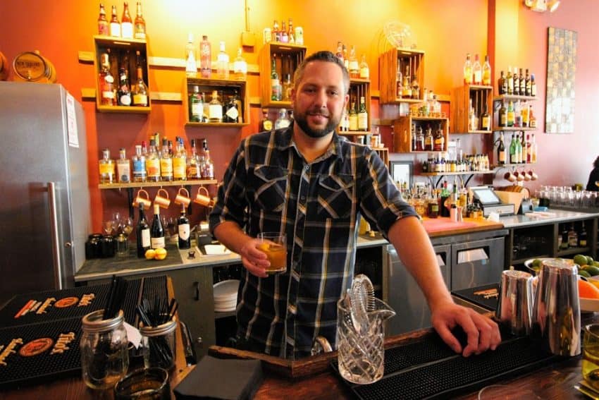 Sur-Lie mixologist, James, and his Poisedon's Wrath drink. 