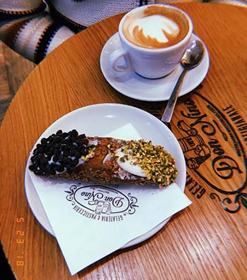 A cappuccino and cannoli after the tour at a cafe near the museum.