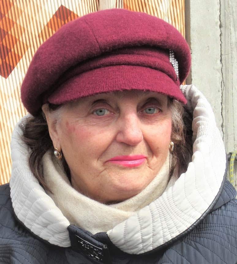 Elegantly attired Flea-market vendor in Kyiv, Ukraine