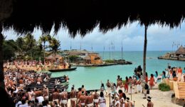 Rowers at Xcaret ready to depart for a nighttime row to Cozumel island.