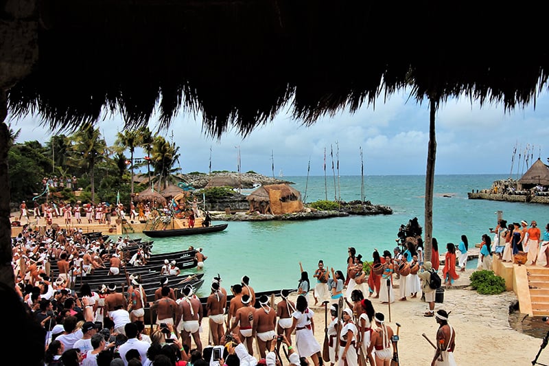 Rowers at Xcaret ready to depart for a nighttime row to Cozumel island.