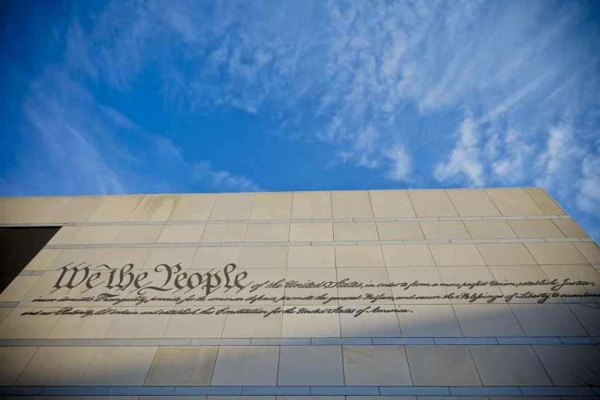 The outside of the Constitution Center, adorned with the first few lines of the Constitution.