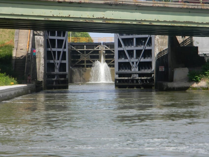 As we traveled west, the Locks (Lock 32) need to lift you up the water level beyond. Here we are waiting for the front gates to open so that we can enter.