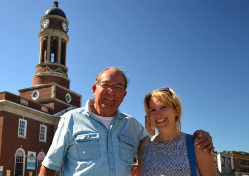 Beautiful blue skies, perfect evening for the first summer Art Walk in downtown Saranac Lake past the Harriettstown Town Hall on Main. Left-Dad, Right-Author