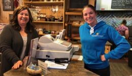 At the Canadian Potato Museum in O'Leary, Donna Rowley, left, served lobster-stuffed spuds along with an extensive history of the potato.