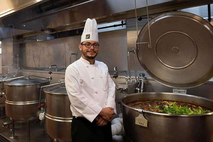 A kitchen tour at Fairmont Le Manoir Richelieu reveals a massive pot chock full of ingredients in a day long simmer, with the end result being a rich stock for various dishes.