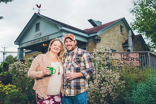 Adrienne & Rob Shaunfield, owners outside of the cafe. Photo by the Farmer's Table Cafe.