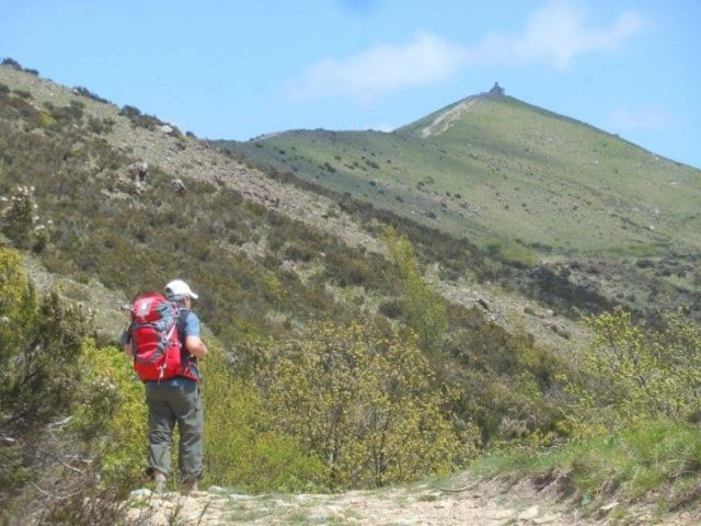 hiking the trail up hill Via Postumia