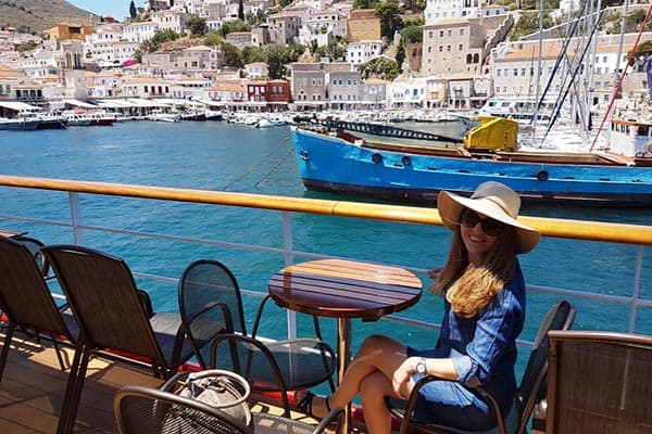 Enjoying a drink at a waterfront bar in Hydra.