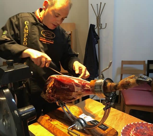 Anselmo Perez shows his ham cutting talents. He's a former world champion ham cutter. Jackie Finch photos.