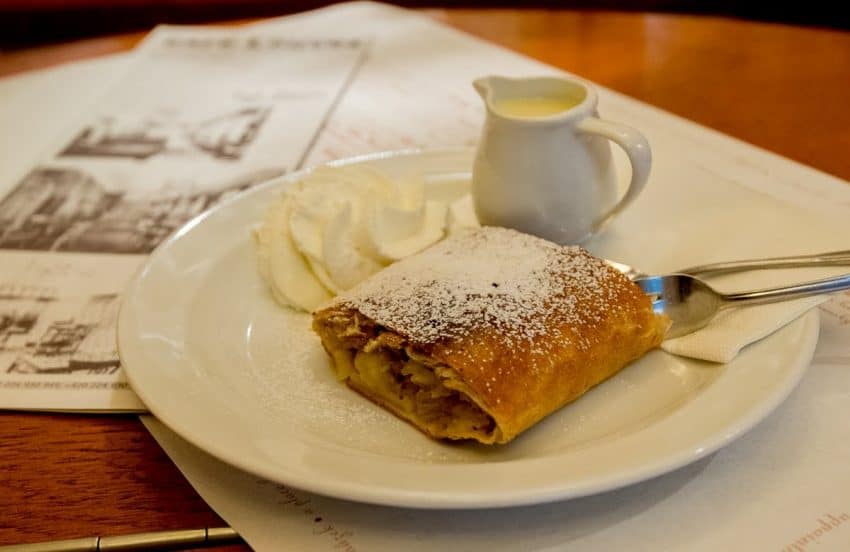 Apple-Strudel A classic Czech dessert is apple strudel, served at Cafe Louvre with whipped cream and a vanilla sauce. Prague, GoNOMAD