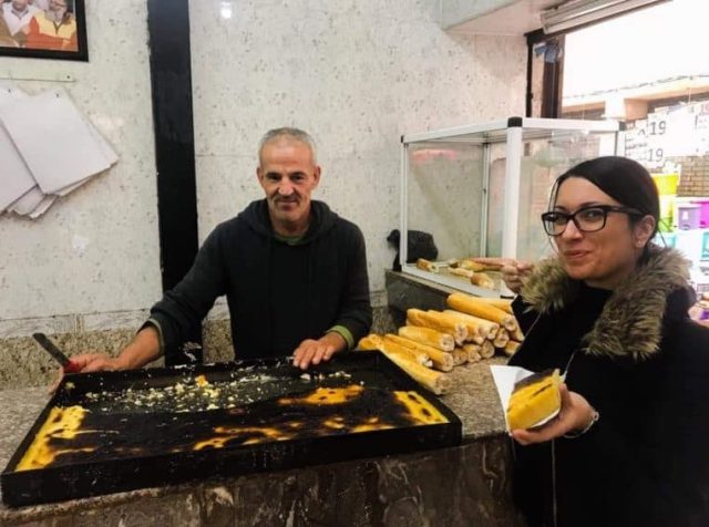 Around the market in Oran - this kind guy made me try one of the typical food, Karentika, made of chickpeas.. for free! Awesome Algerians algeria