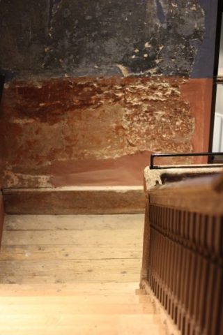 Original wall paint, floors and staircase in 14 Henrietta. Paint: Red Rattle and Rackets Blue.