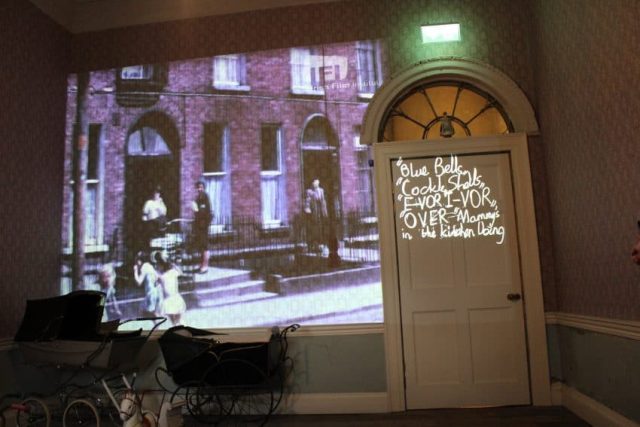 Inside the Henrietta House. A video display of the history and residents of the home.