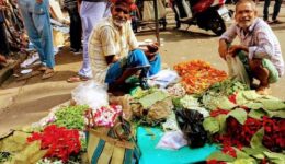 The world passes by surrounding the Chinese Breakfast stalls in Terreti Bazaar in Kolkata, India